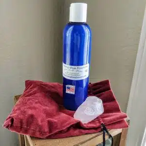 8 ounce plastic blue bottle with white cap